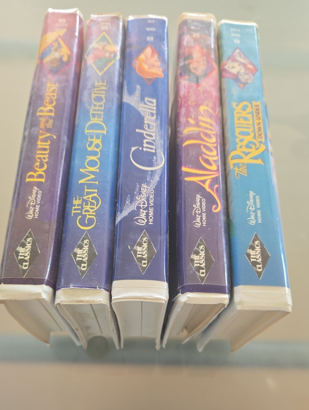 Disney VHS Classics Set with Blue, Purple and Teal Spines